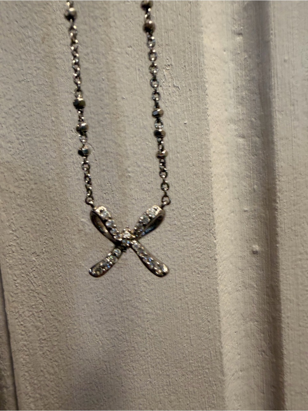 Kendra Scott Silver Crystal Cross Ribbon Necklace